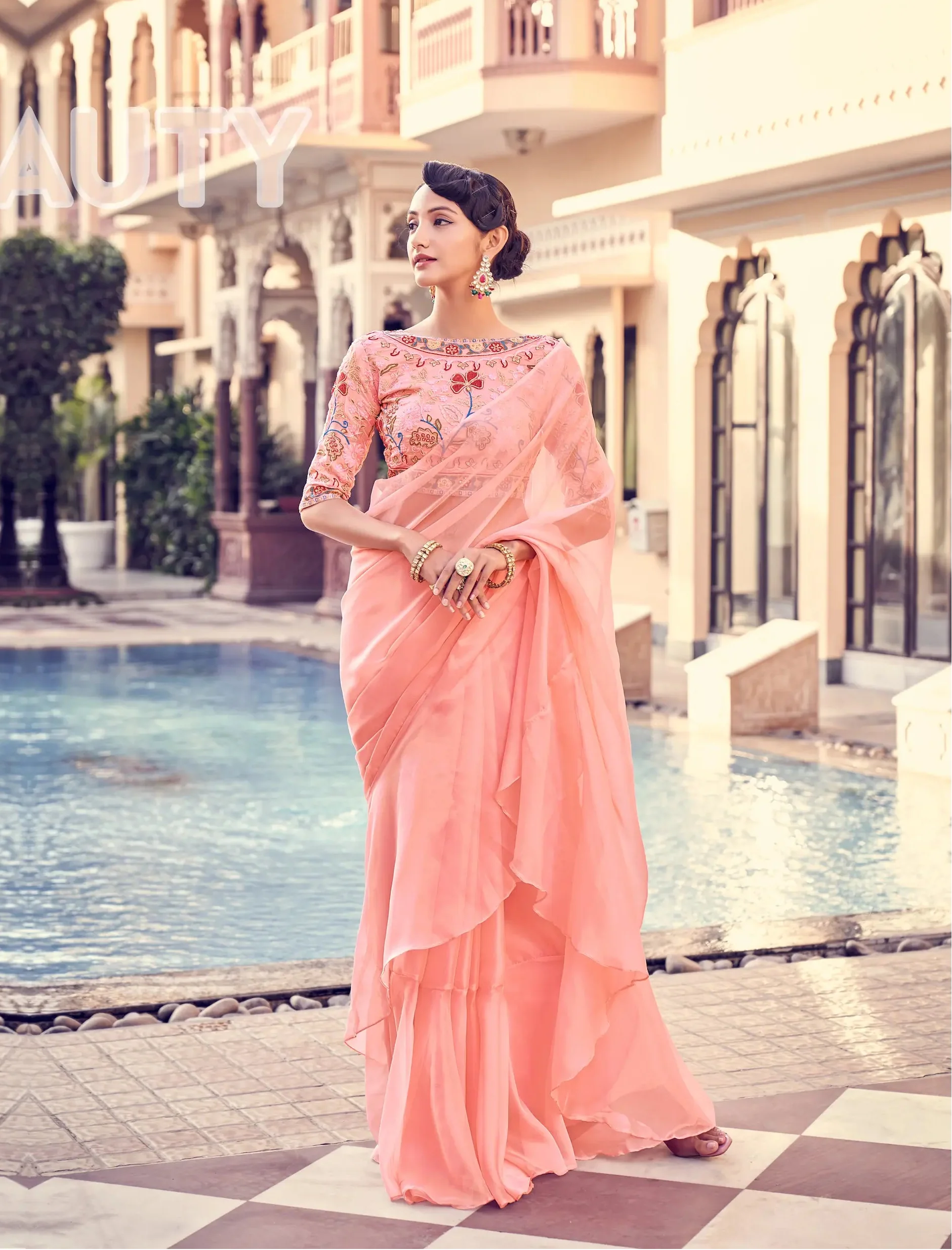 Peach Pink Organza Ruffle Saree With Embroidered Blouse - qivii