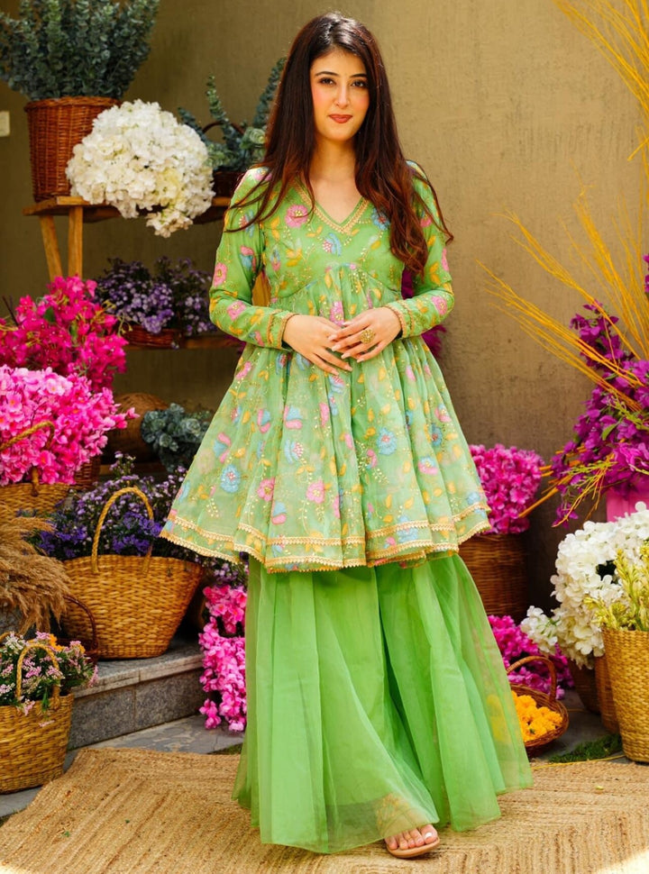 Pista green color organza printed salwar suit with dupatta by Qivii