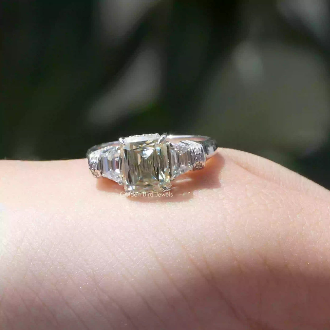 Criss And Trapezoid Cut Three Stone Engagement Ring