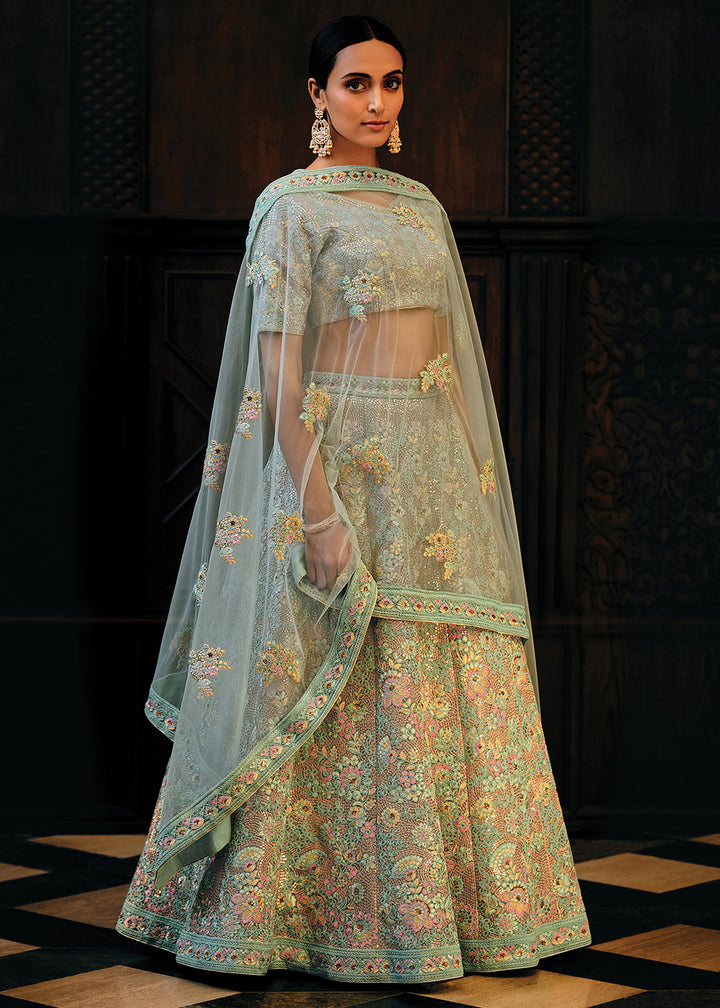 Shades Of Blue Heavy Embroidered Net Lehenga Choli  - By Qivii