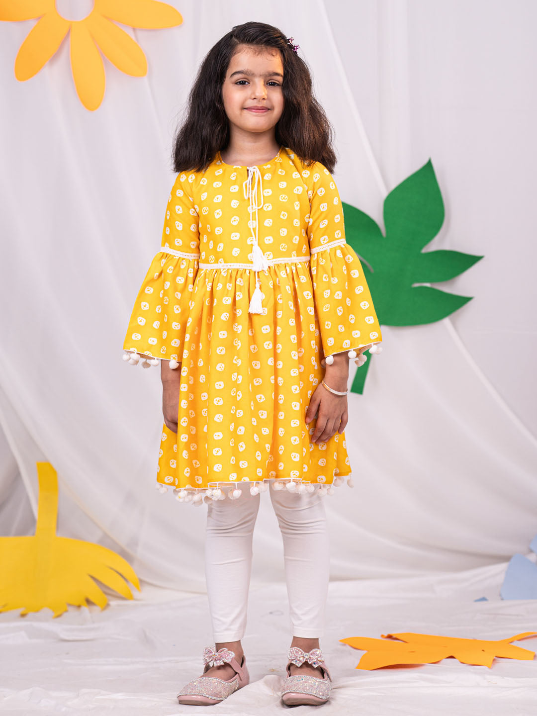 VASTRAMAY Girl's Yellow Printed Ruffle Kurta With Leggings Set