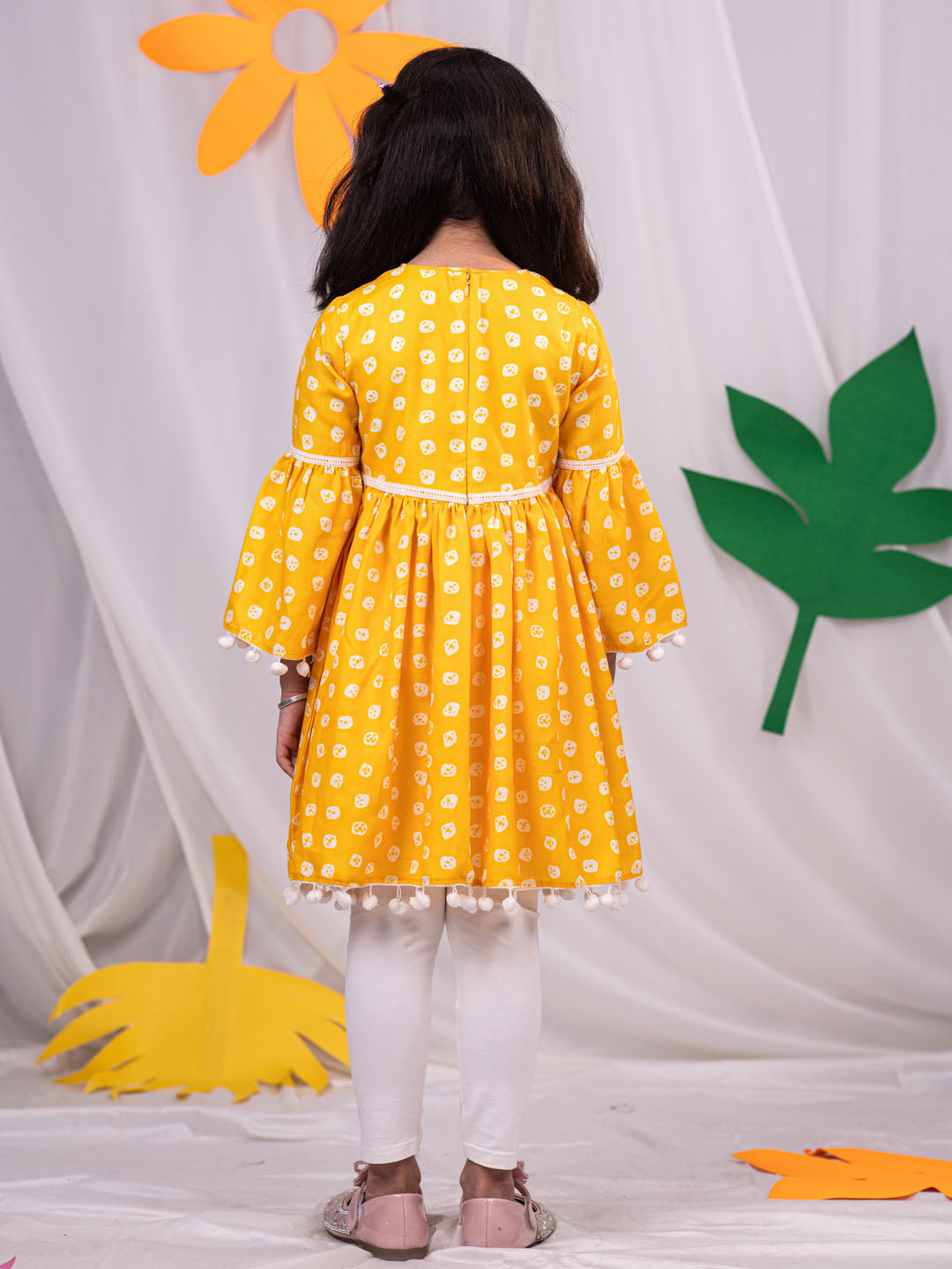 VASTRAMAY Girl's Yellow Printed Ruffle Kurta With Leggings Set