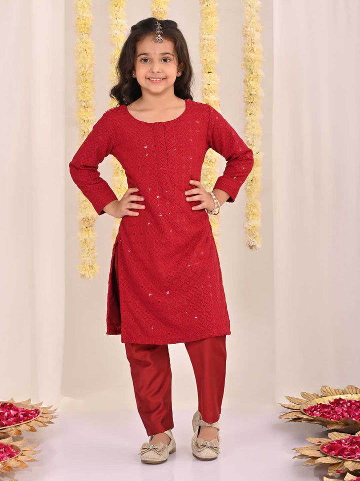 VASTRAMAY Girls' Maroon Embellished Kurta Pyjama Set with intricate embroidery and matching pants, perfect for traditional occasions and events