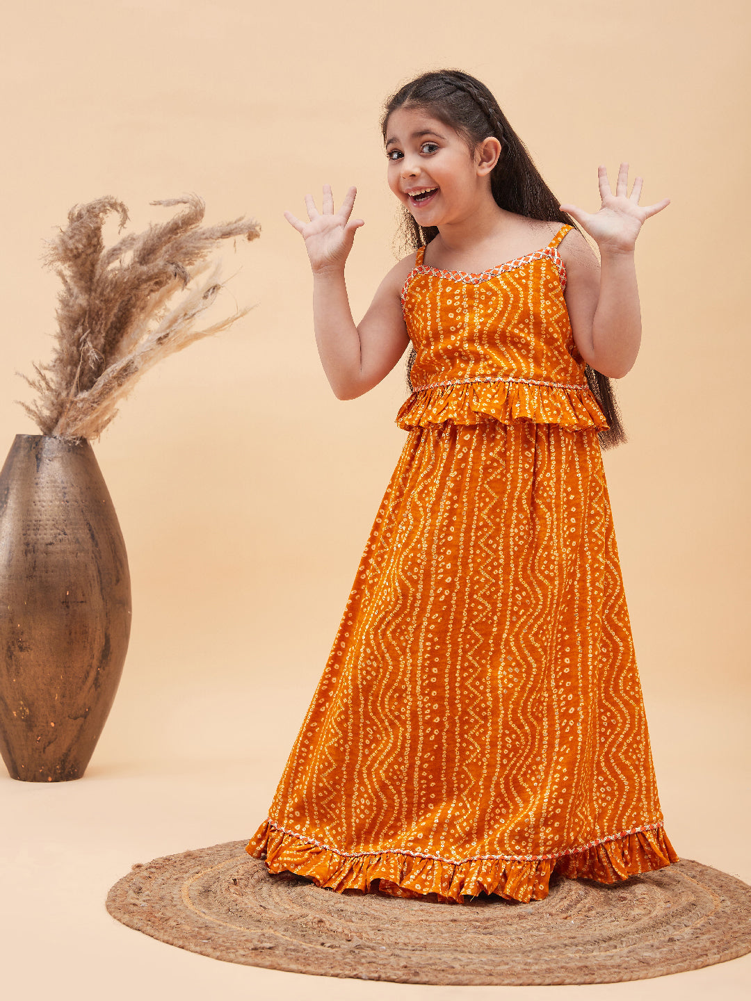 VASTRAMAY Girl's Orange Bandhani Top And Long Skirt Set