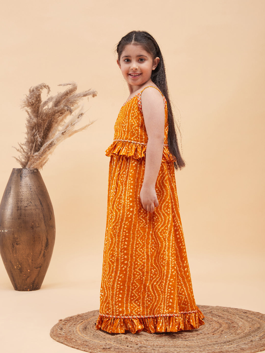 VASTRAMAY Girl's Orange Bandhani Top And Long Skirt Set