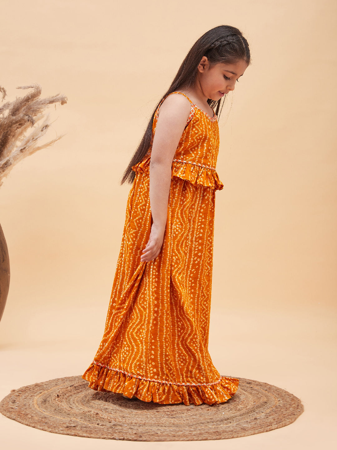 VASTRAMAY Girl's Orange Bandhani Top And Long Skirt Set