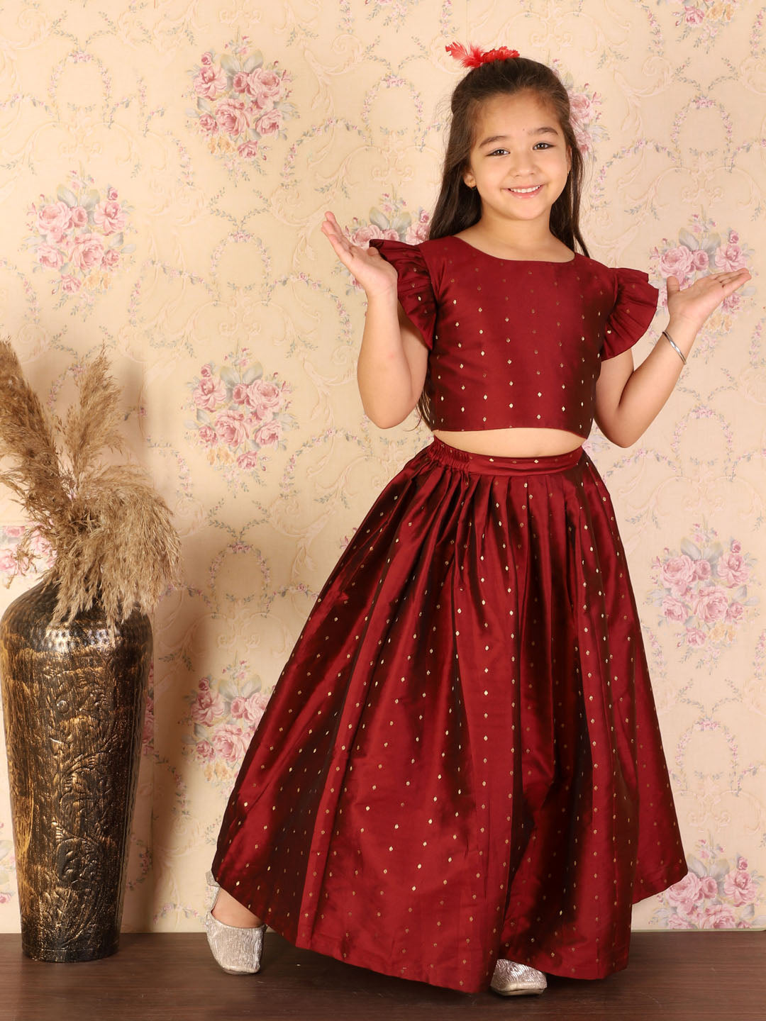 VASTRAMAY Girl's Maroon Woven Design Booti Crop Top And Long Skirt Set