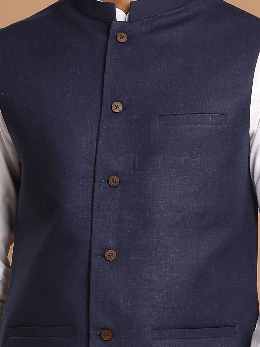  Back view of VASTRAMAY Navy Blue Cotton Blend Nehru Jacket showcasing its elegant stitching and traditional Nehru style