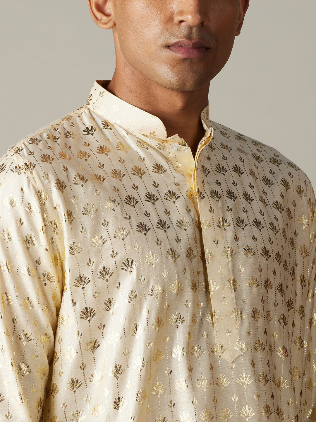 VASTRAMAY Men's Gold Foil Printed Kurta With Cream Patiala Set - Traditional Indian ethnic wear for men featuring a golden printed kurta and cream patiala pants