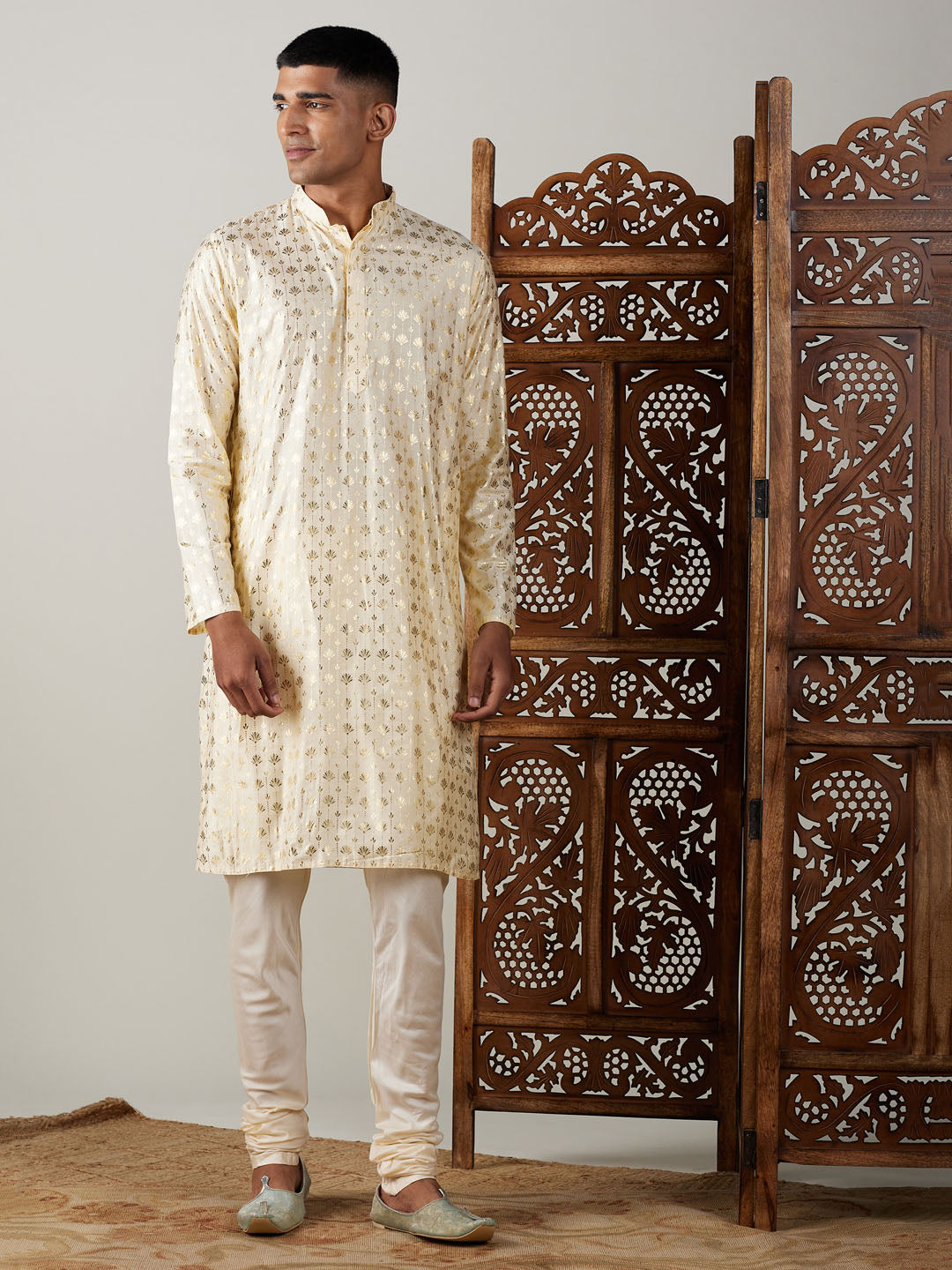  Detailed design and pattern of gold foil print on men's kurta 