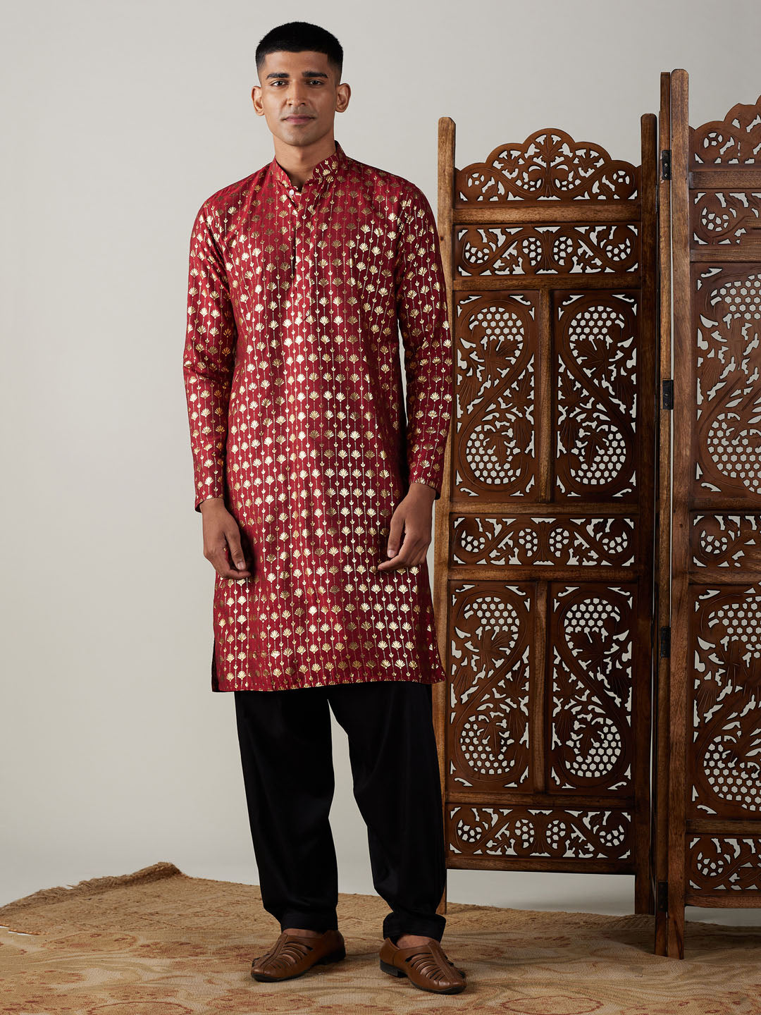 The maroon foil print on the kurta, featuring a traditional yet contemporary pattern