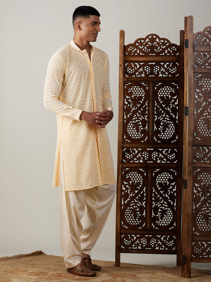 Yellow and white kurta with front buttons and matching patiala