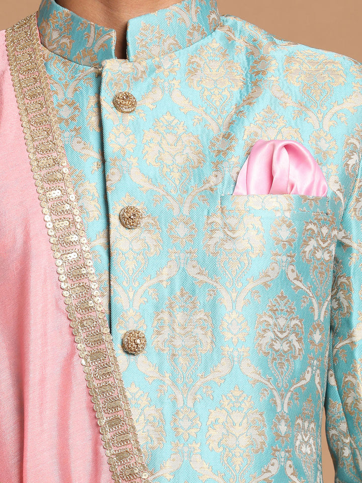 A luxurious VASTRAMAY Sea Green and Gold Brocade Jacquard Sherwani Set with intricate detailing, accompanied by a stunning Pink Dupatta