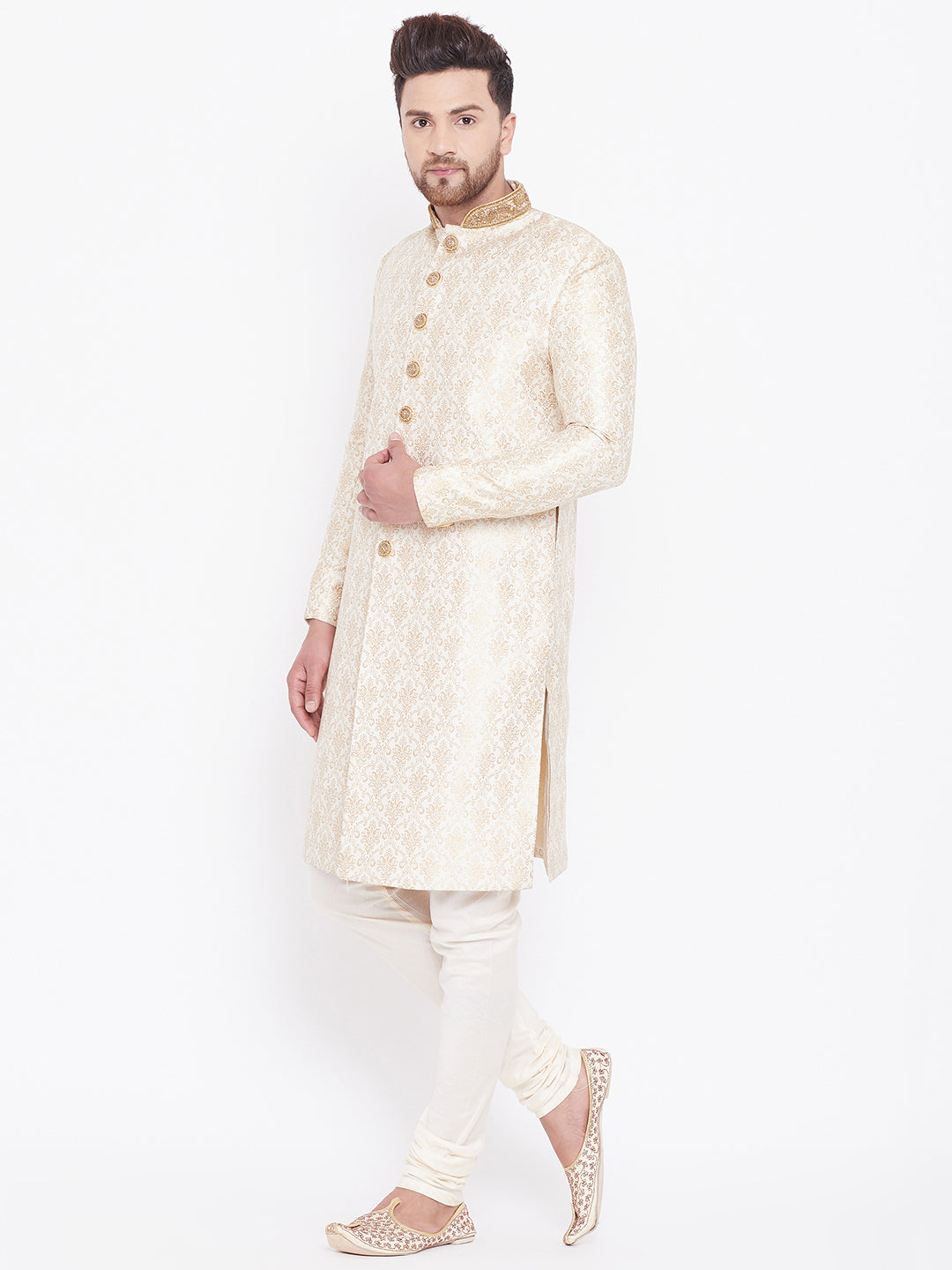 VASTRAMAY Men's Beige And Gold Embroidered Brocade Sherwani Set showcasing traditional Indian groom attire with intricate gold embroidery and elegant beige fabric