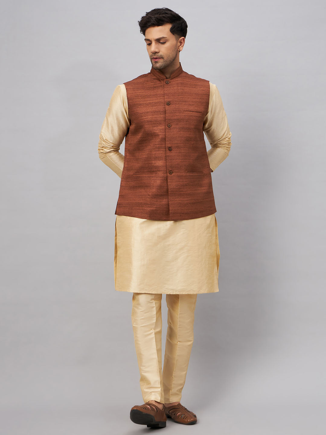  Elegant and modern men's coffee jacket with matching gold kurta and pant 