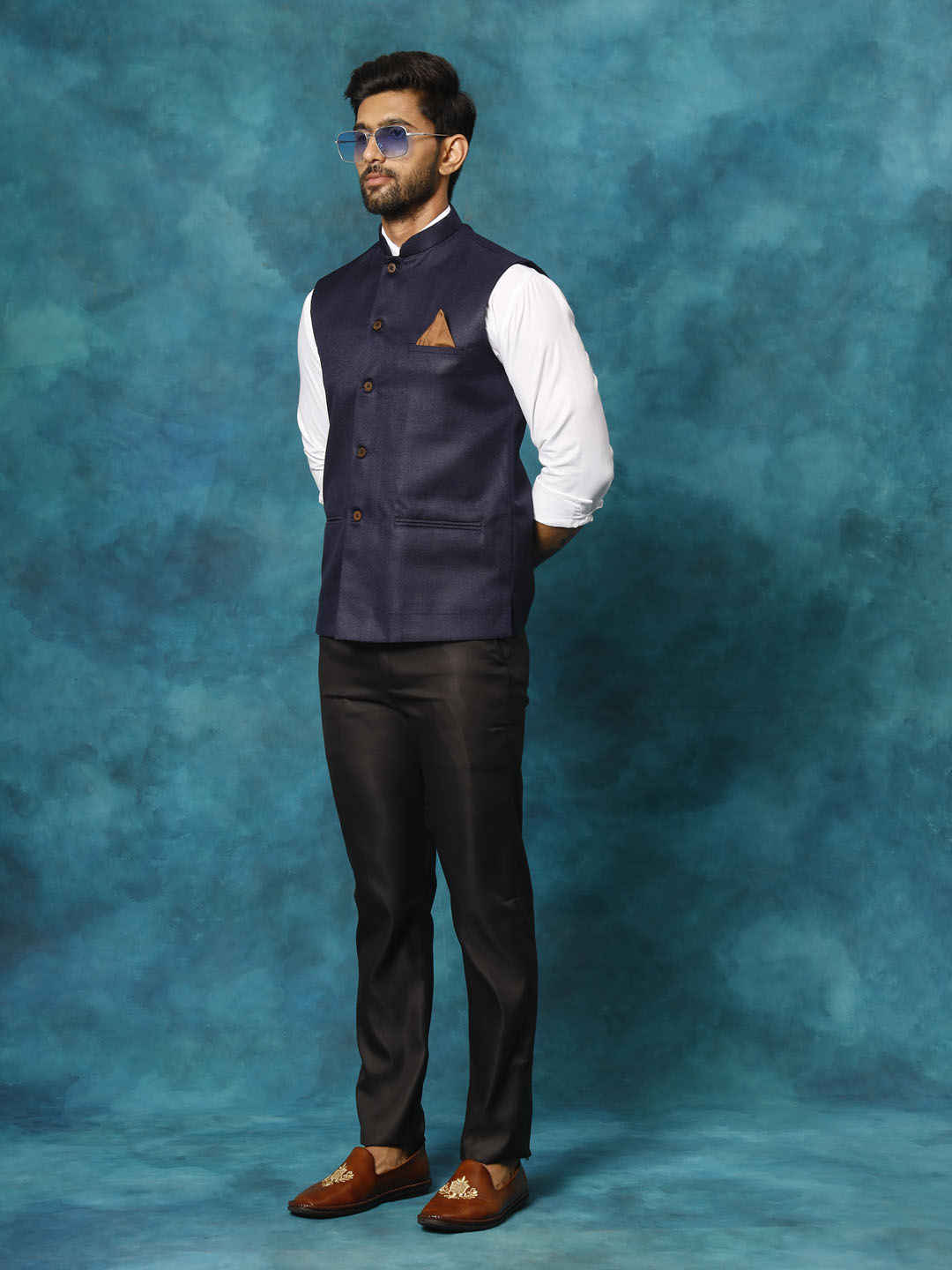  Side view of VM BY VASTRAMAY Men's Navy Blue Woven Nehru Jacket showing the tailored fit and pocket details