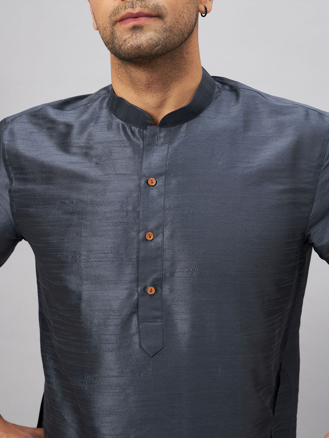  Close-up of the fine cotton silk blend fabric in grey color, showcasing the luxurious texture and quality of the kurta