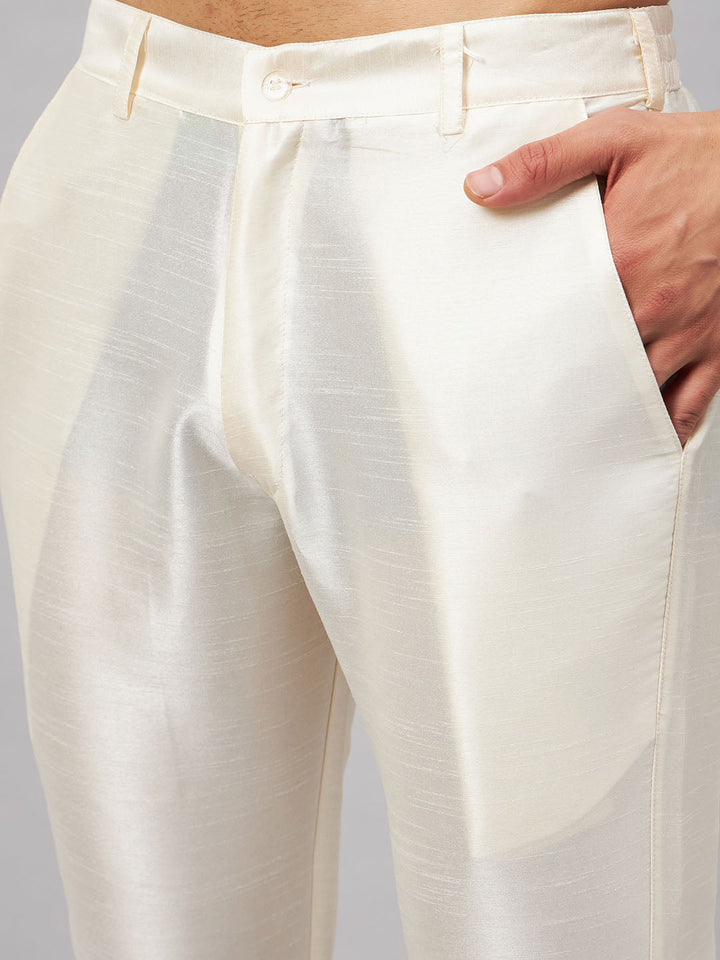  Side view of the cream pant, tailored to perfection with a comfortable fit and stylish look