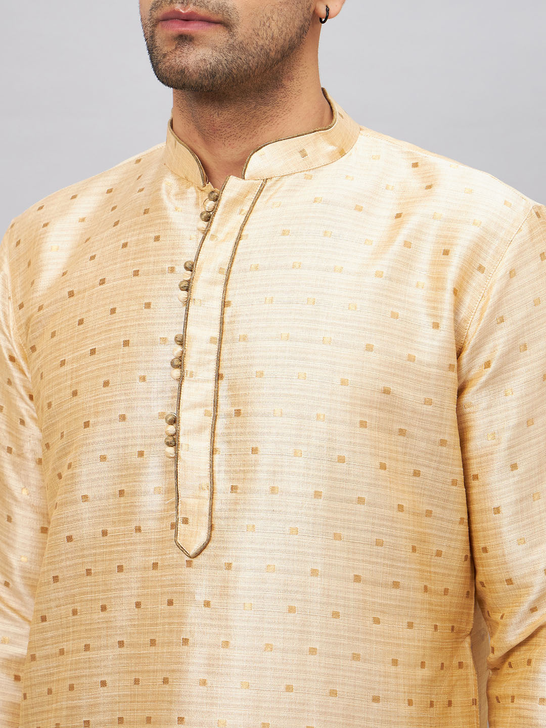 Model wearing the VM BY Men's Gold Zari Weaved Kurta Dhoti Set in a stylish and traditional manner