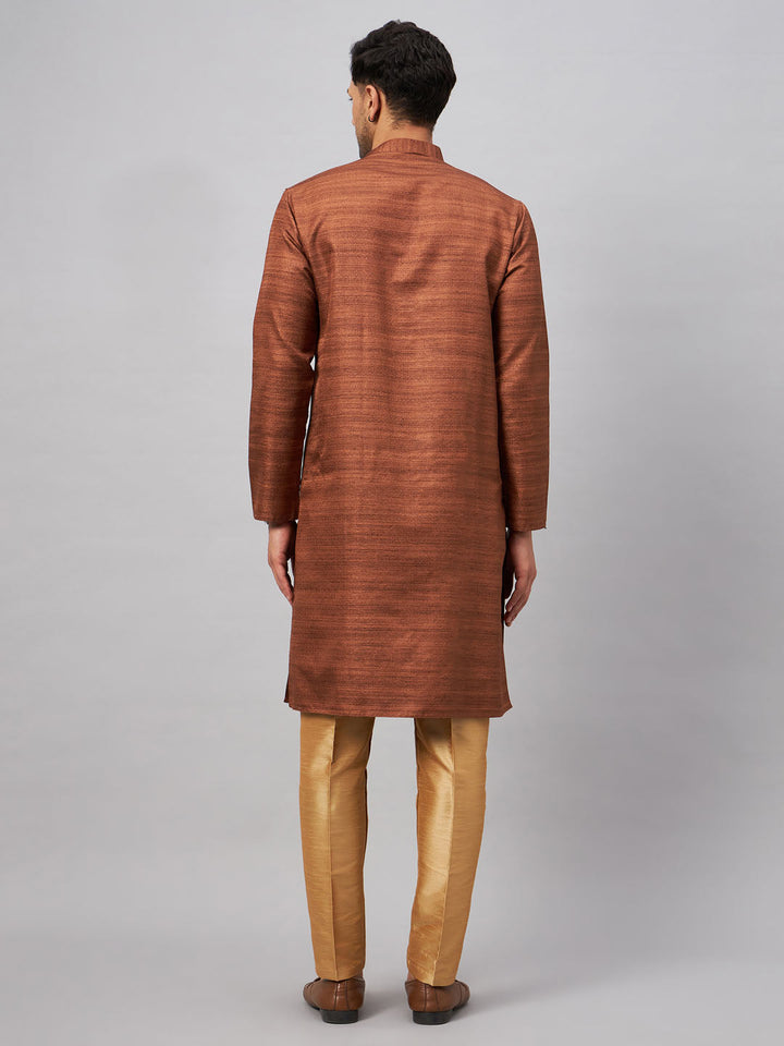 Handsome man wearing VASTRAMAY Men's Coffee Kurta with intricate embroidery and matching Rose Gold Pant for a stylish and sophisticated look