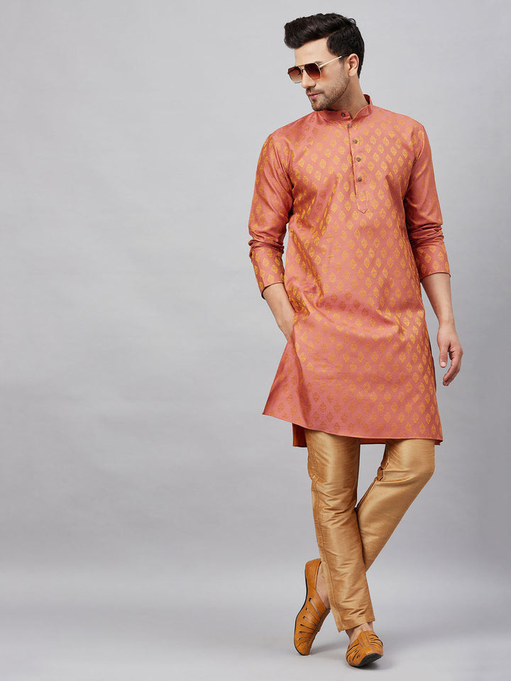 Elegant traditional Indian attire for men in pink and rose gold color