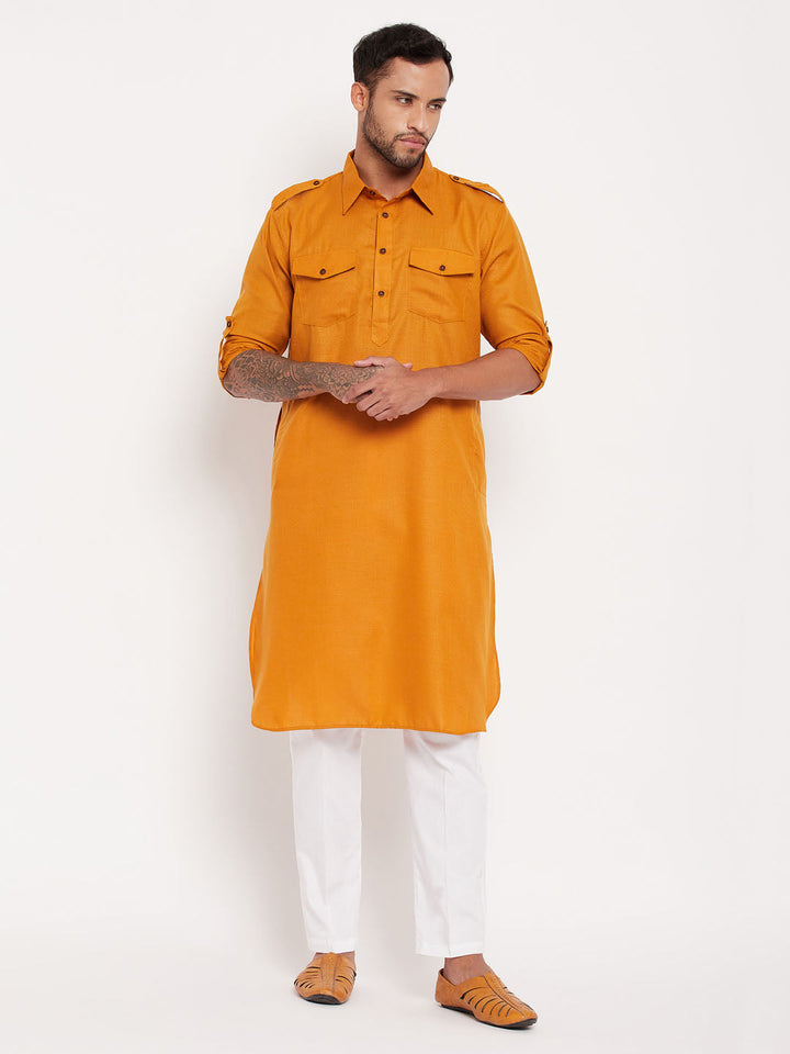  Close-up of VM By VASTRAMAY Men's Rust Pathani Suit, intricate embroidery details, premium craftsmanship, comfortable and breathable material, classic and sophisticated look 