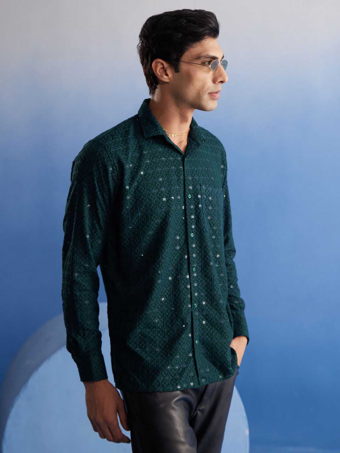  Close-up of the intricate embellishments on the chest pocket of the VM By VASTRAMAY Men's Green Rayon Shirt