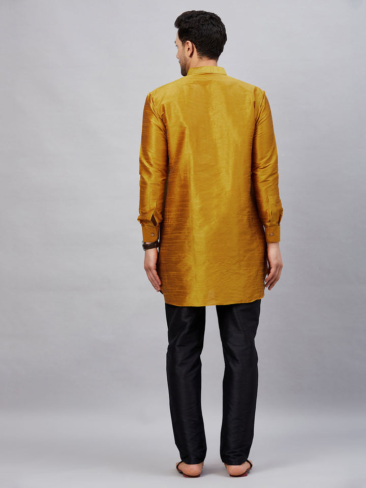 Handsome man wearing elegant Vastramay Men's Mustard Silk Kurta Set for special occasions