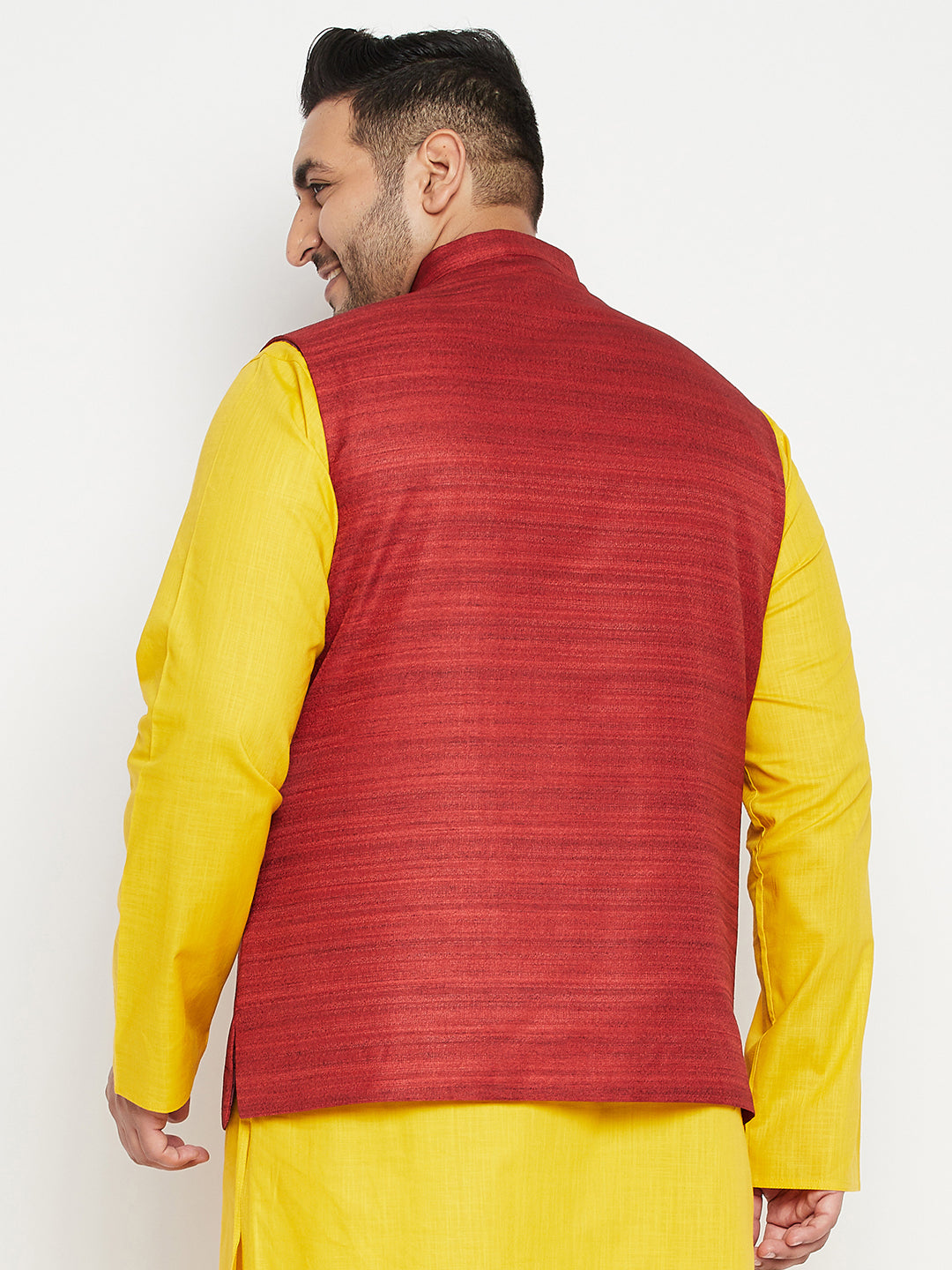 Model wearing VASTRAMAY Men's Plus Size Maroon Color Matka Silk Textured Nehru Jacket with traditional white kurta pajama