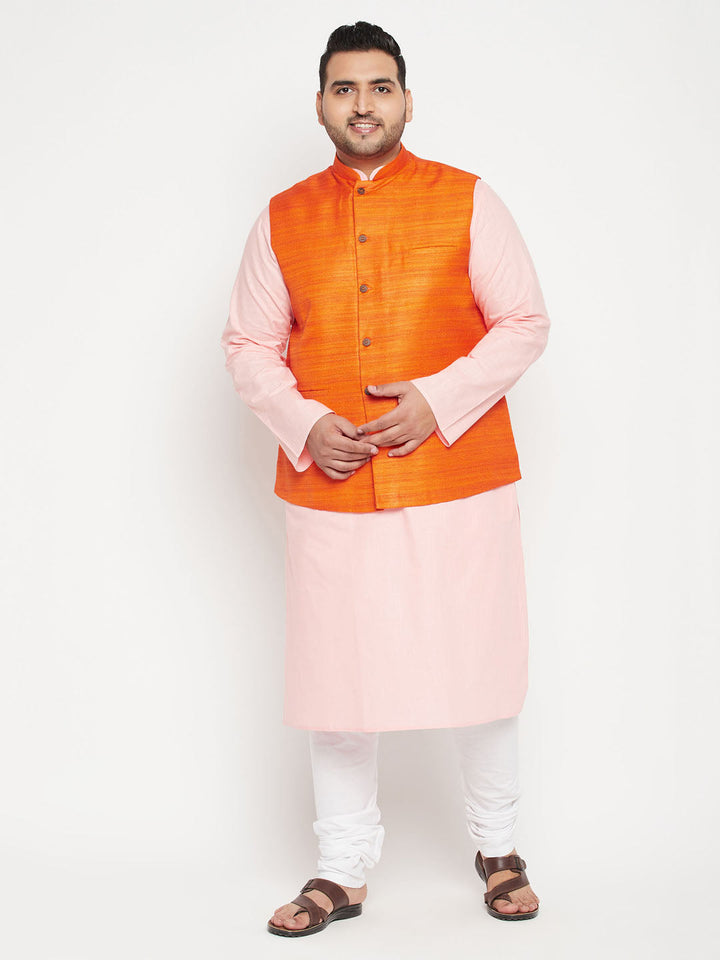 A traditional Indian men's outfit set featuring a pink kurta, white pyjama, and a vibrant orange Nehru jacket