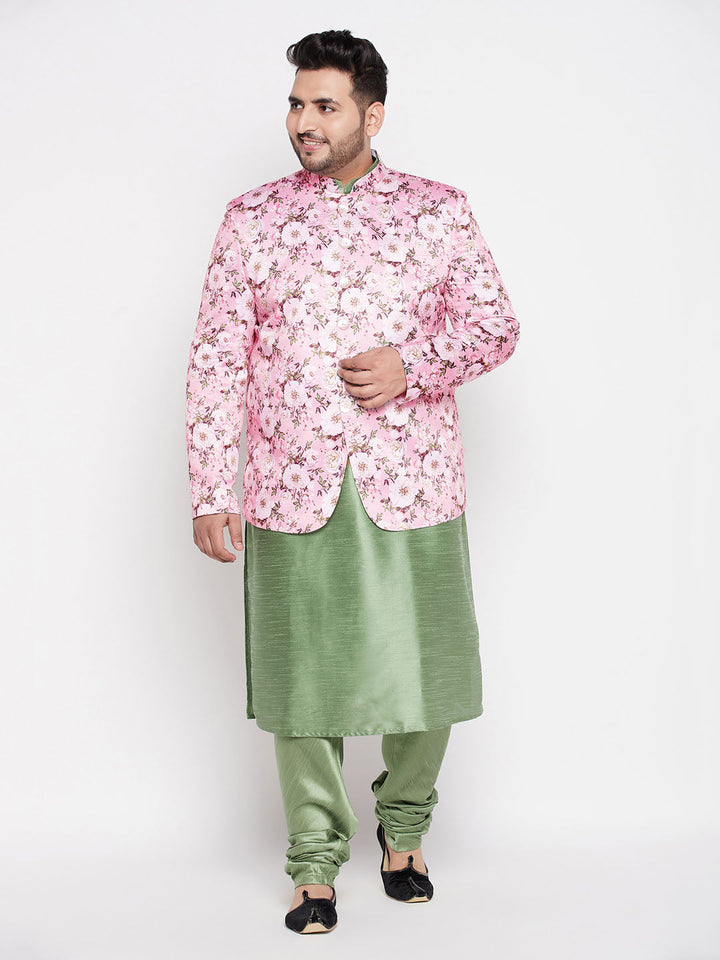 A traditional Indian men's outfit consisting of a pink silk blend Jodhpuri jacket paired with a mint green kurta and pyjama set