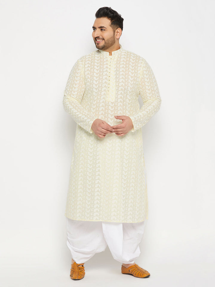 Men's plus size yellow chikankari embroidered kurta and white dhoti set for traditional Indian attire