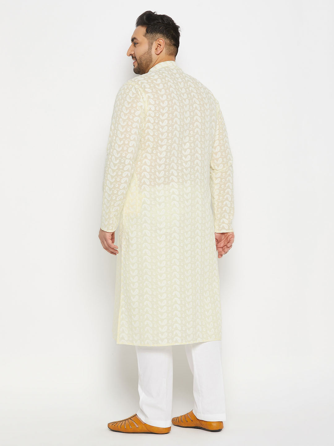 VASTRAMAY Men's Plus Size Yellow Chikankari Embroidered Kurta And White Cotton Pant Style Pyjama Set showcased on a mannequin