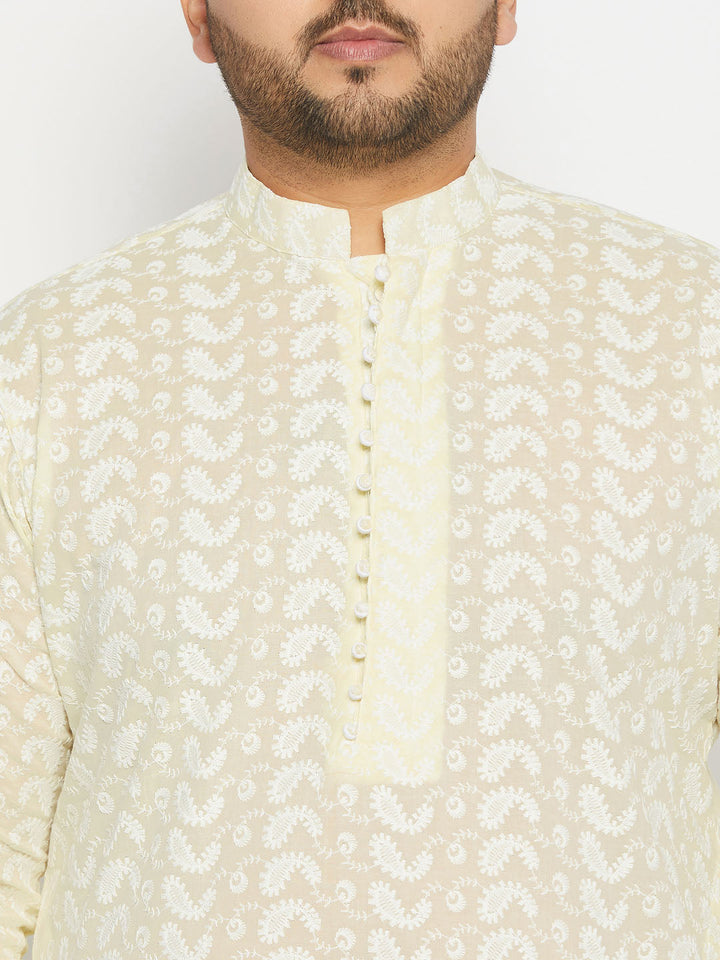 Detailed shot of the white pyjama of VASTRAMAY Men's Plus Size Yellow Chikankari Embroidered Kurta And White Pyjama Set, featuring a relaxed and roomy fit