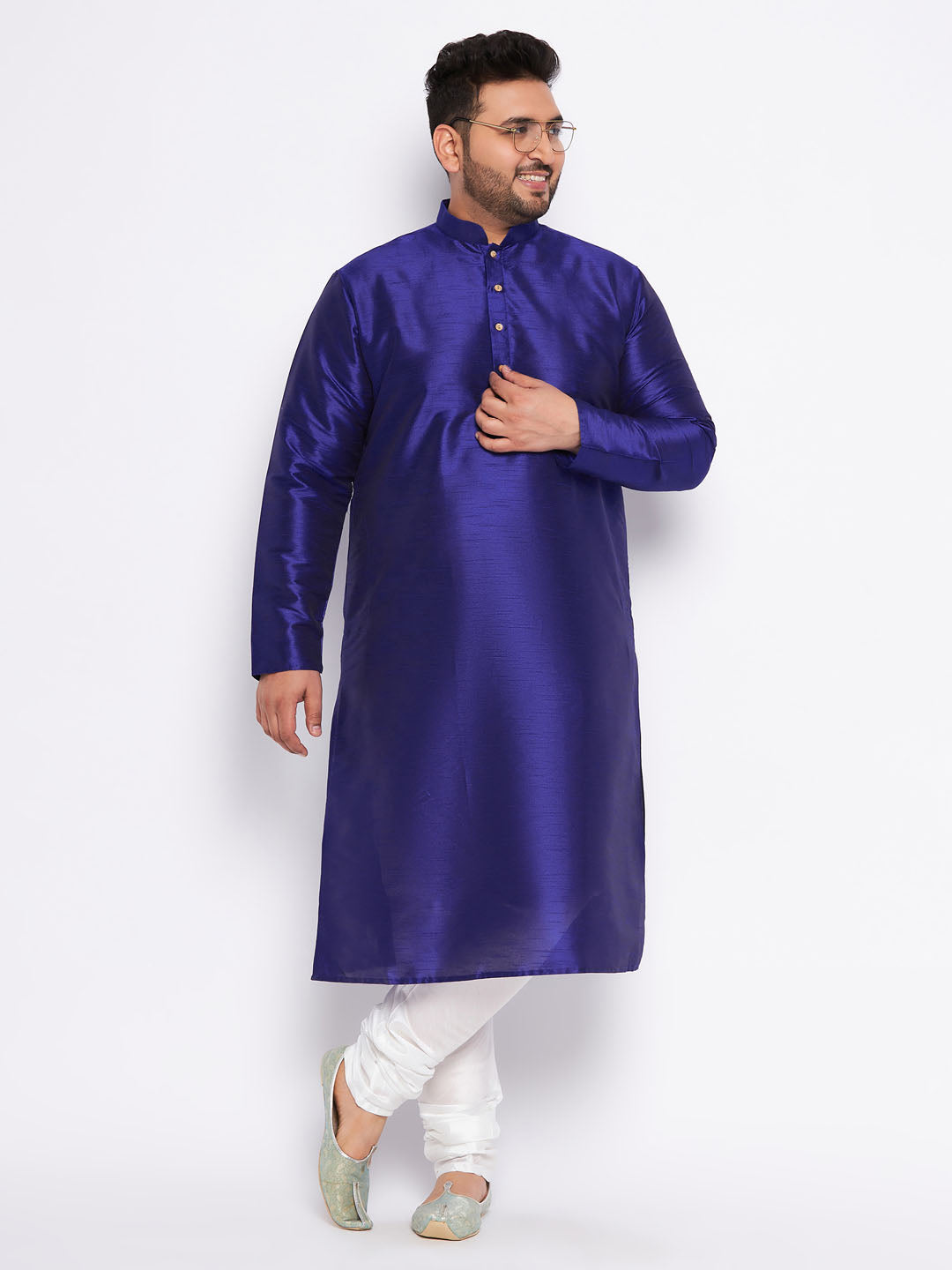 Traditional Indian men's outfit with silk blend kurta and white pyjama