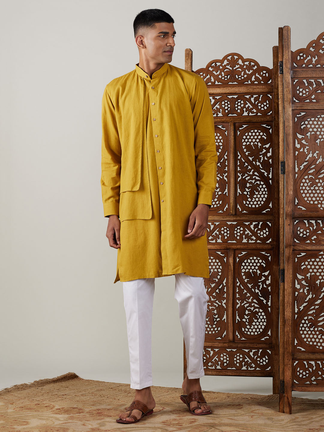 Vastramay Men's Mustard Cotton Cool Dyable Kurta with white Pant Set displayed as a stylish and comfortable ethnic wear