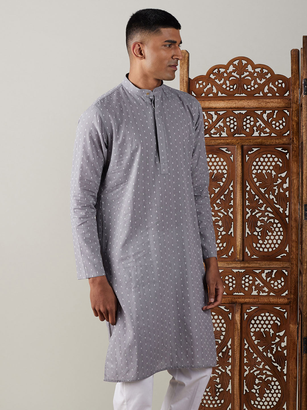  Close-up of the jacquard fabric detailing on the SHVAAS By VASTRAMAY Men's Grey cotton Kurta