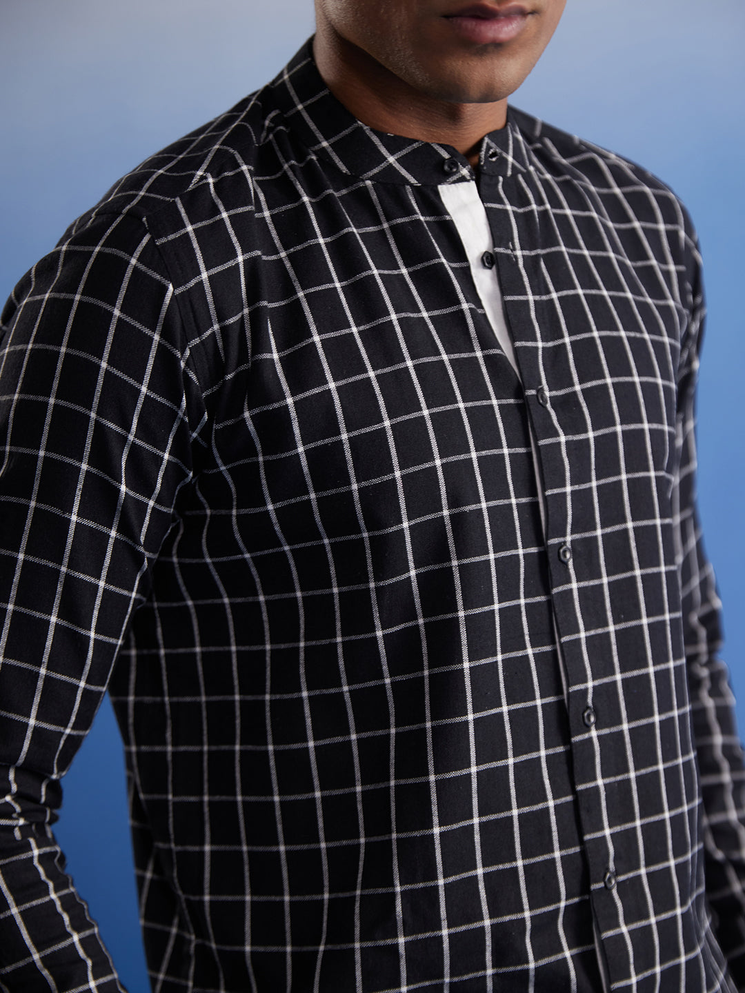  Stylish VASTRAMAY Men's Black Checked Cotton Shirt on a male model with rolled-up sleeves