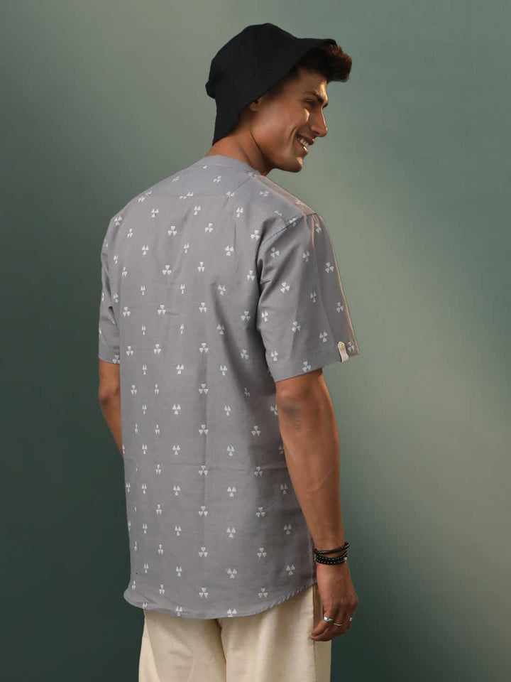 
VASTRAMAY Men's Grey Cotton Jacquard Short Kurta - Side View showing the straight fit and comfortable cotton fabric