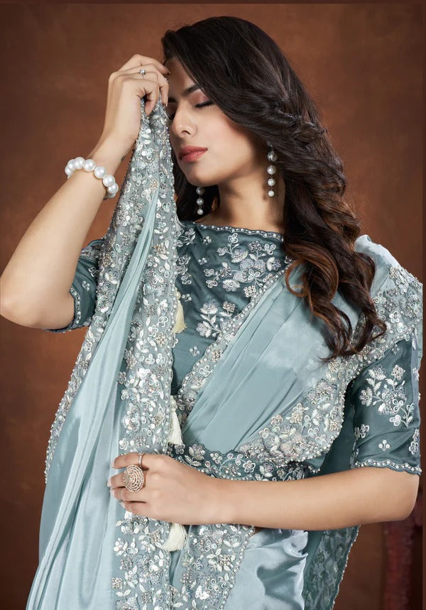 Turquoise Crepe Satin Silk Embroidered Saree With Stitched Blouse showcasing intricate embroidery and elegant design for a stunning look