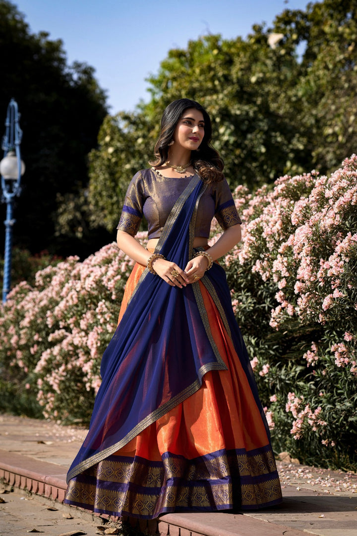 South-style Kanchipuram silk lehenga choli in Orange Color