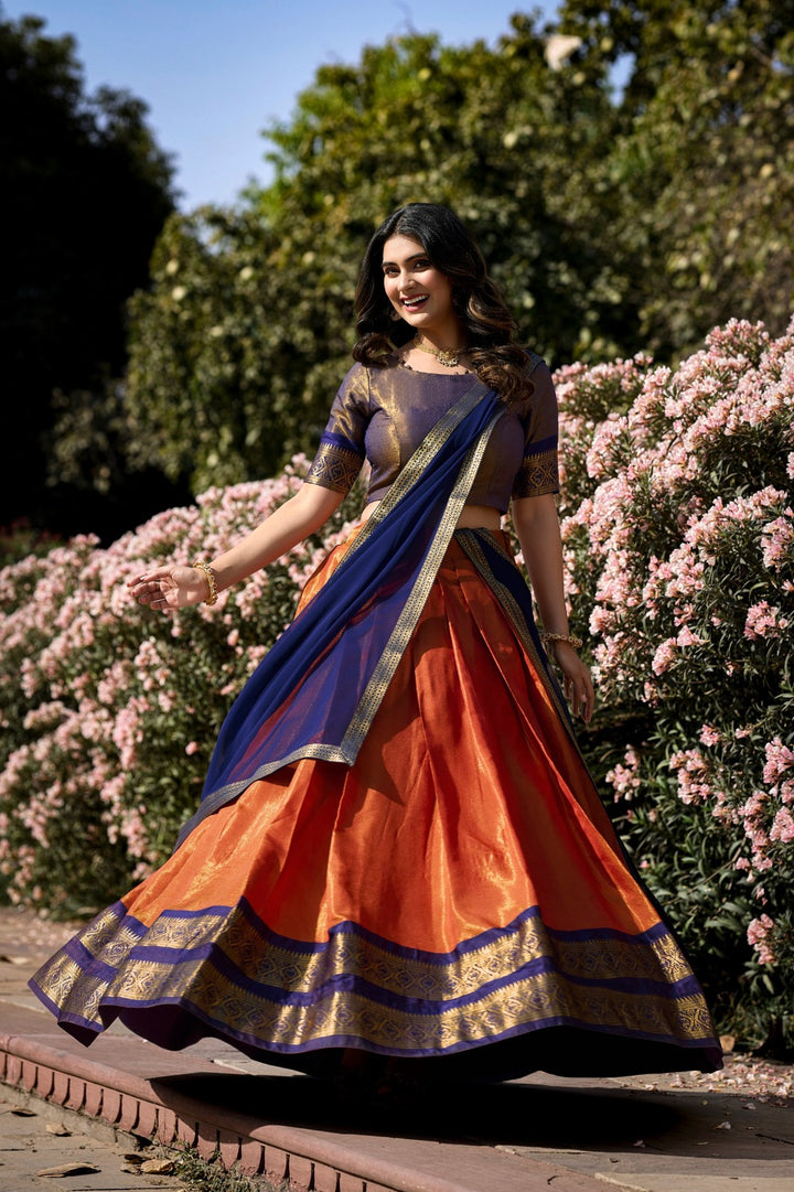 South-style Kanchipuram silk lehenga choli in Orange Color