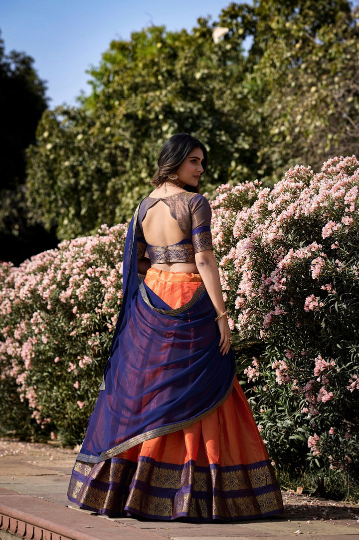 South-style Kanchipuram silk lehenga choli in Orange Color