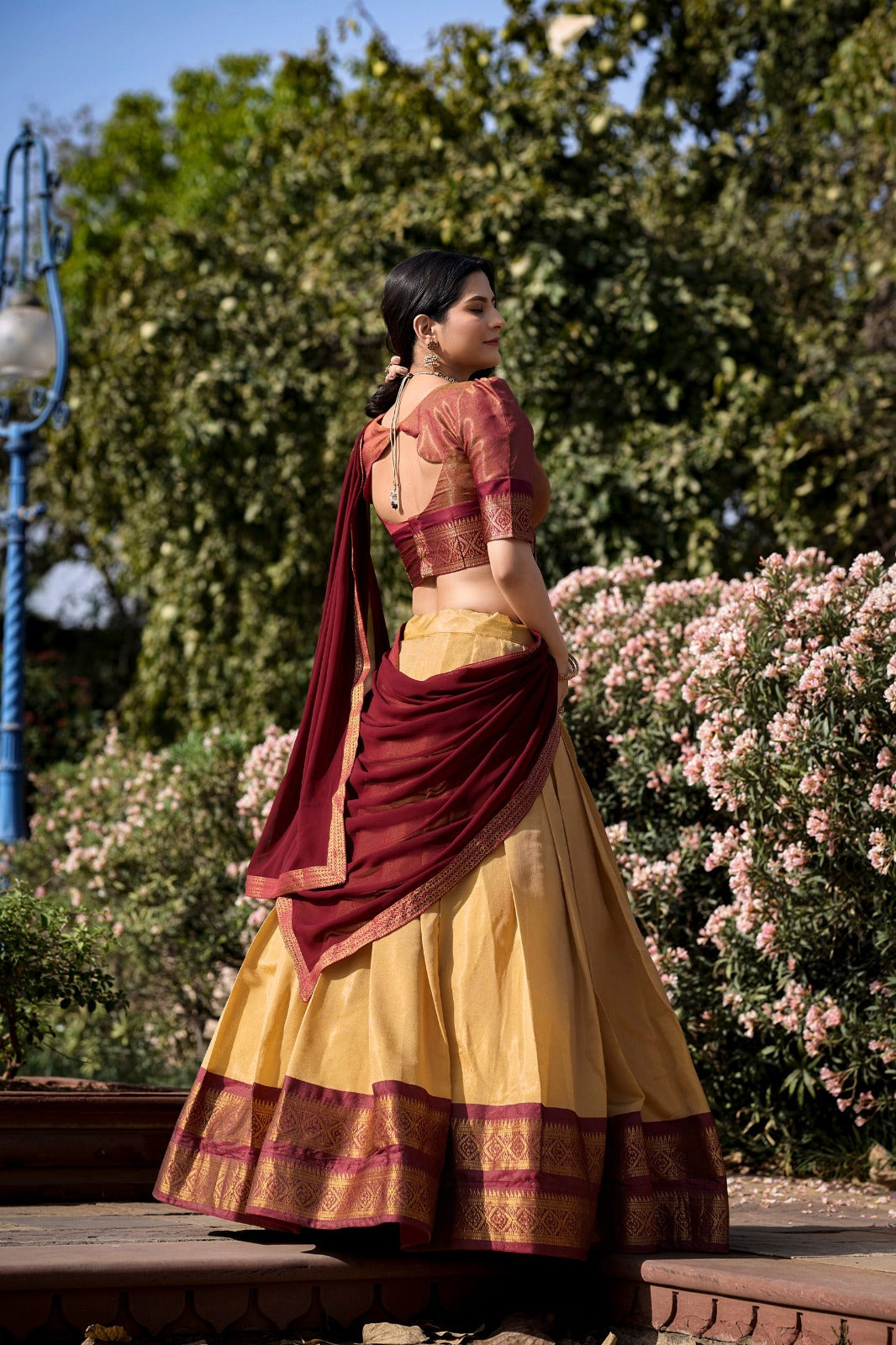 Elegant Kanchipuram silk lehenga choli in cream for special occasions