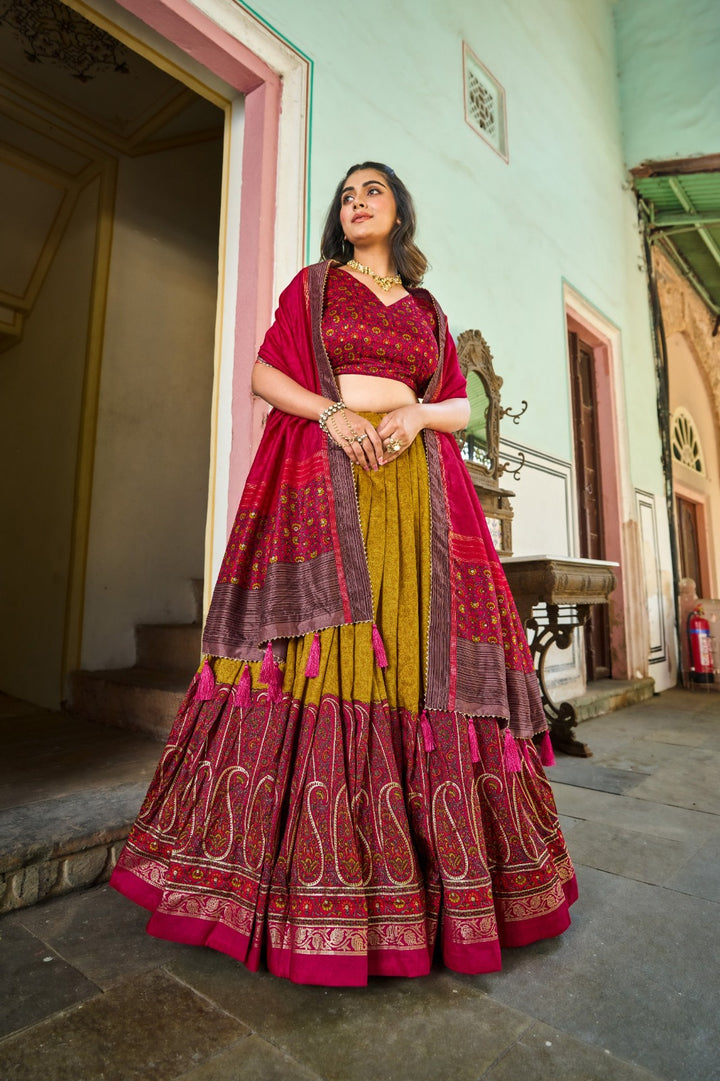 Breathtaking Tussar Silk Lehenga Choli Featuring Stunning Kashmiri Print In Mustrard Color