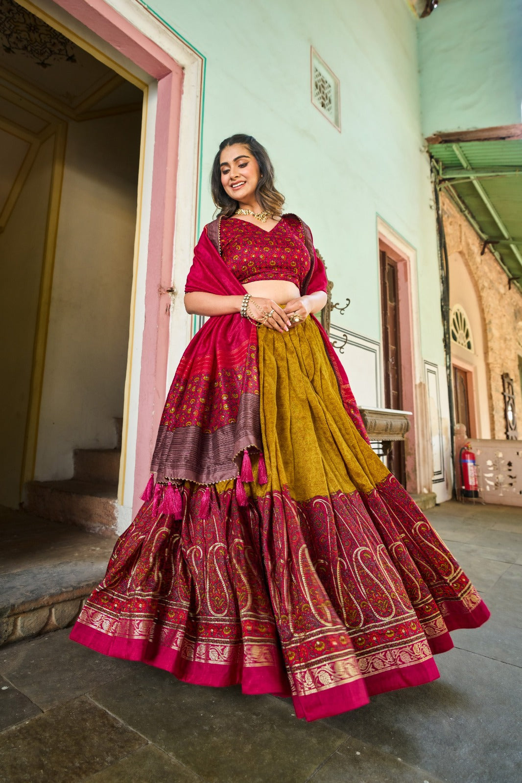 Breathtaking Tussar Silk Lehenga Choli Featuring Stunning Kashmiri Print In Mustrard Color