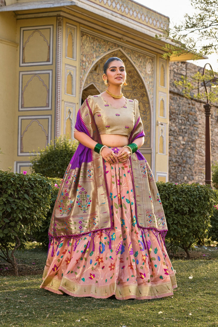 Captivate hearts and turn heads in our Jacquard Silk Paithani Lehenga Choli in Peach Color