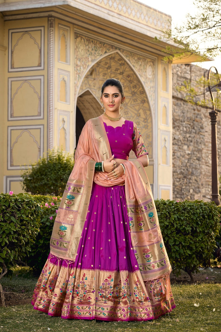 Captivate hearts and turn heads in our Jacquard Silk Paithani Lehenga Choli in Purple Color