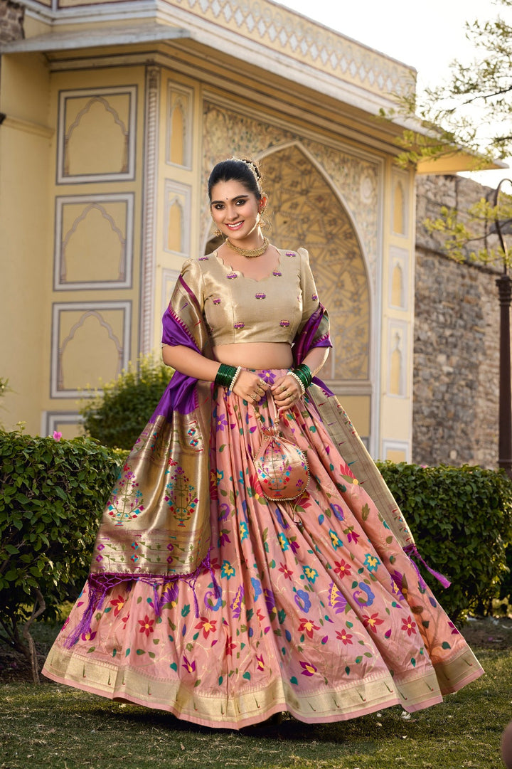 Captivate hearts and turn heads in our Jacquard Silk Paithani Lehenga Choli in Peach Color