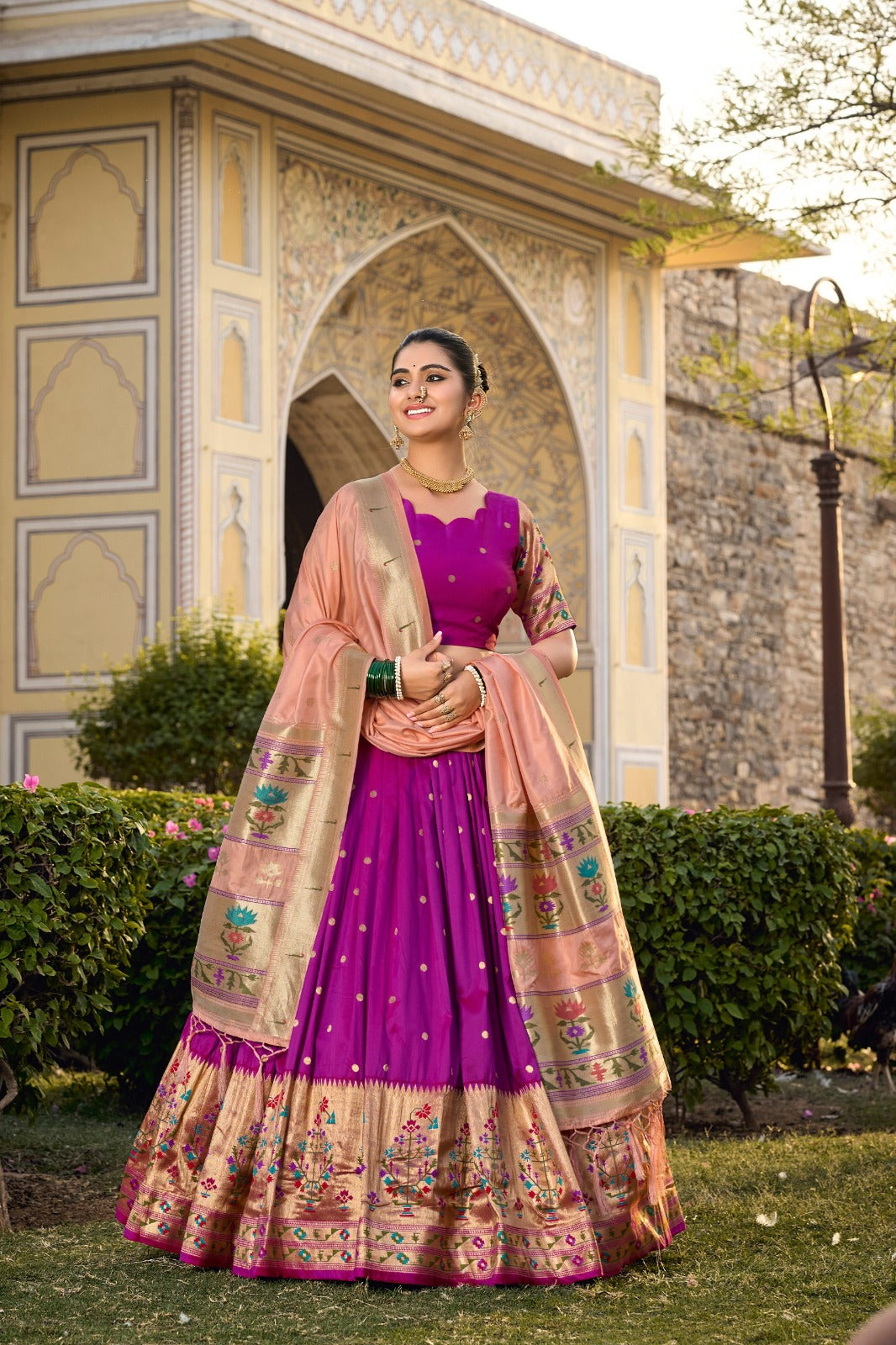 Captivate hearts and turn heads in our Jacquard Silk Paithani Lehenga Choli in Purple Color